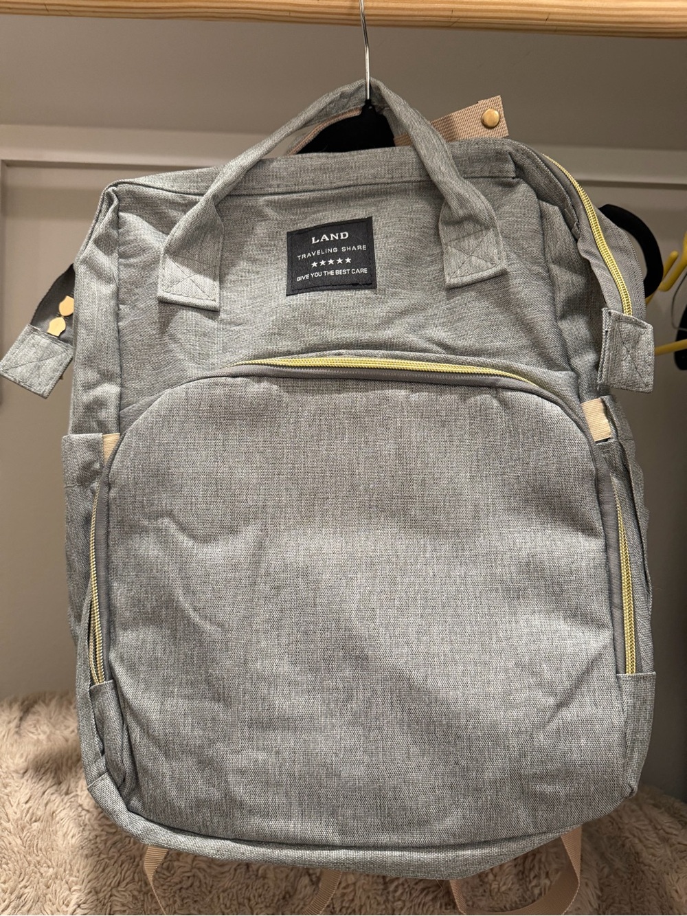 LAND Light Gray Diaper Backpack with Yellow Zipper Accents